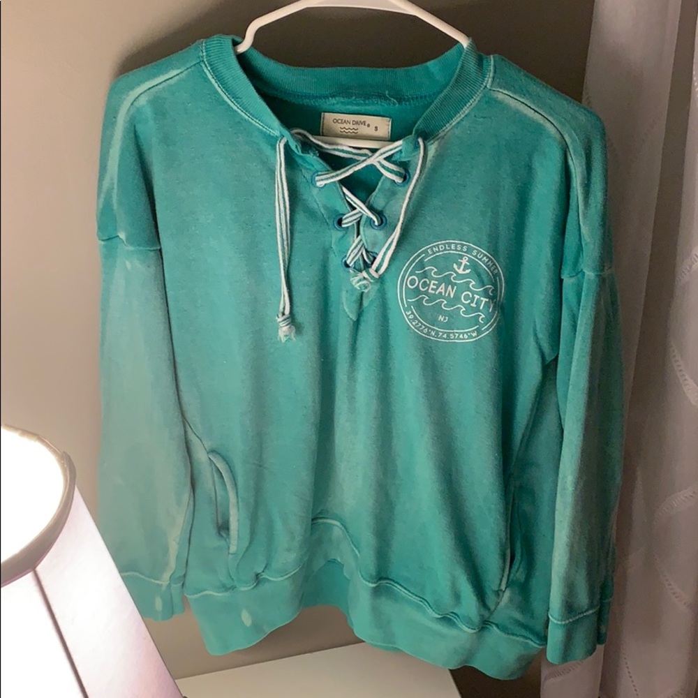 Lace up, relaxed fit teal sweatshirt